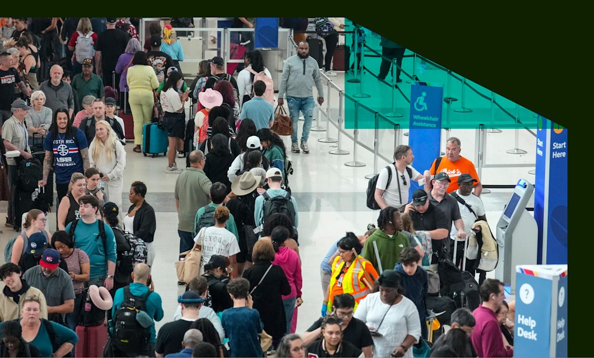 Travelers wait in long lines at Houston International Airport