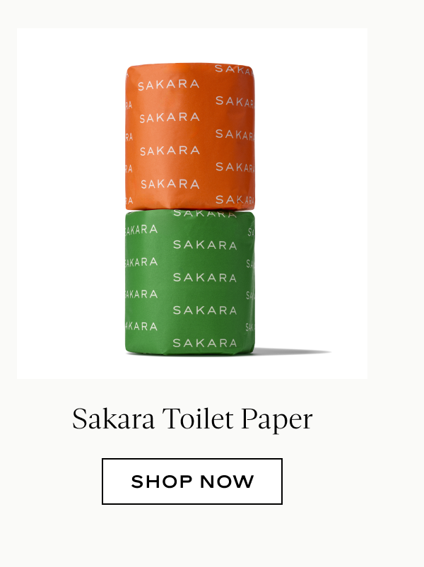 Stack of two Sakara-branded toilet paper rolls in orange and green wrapping