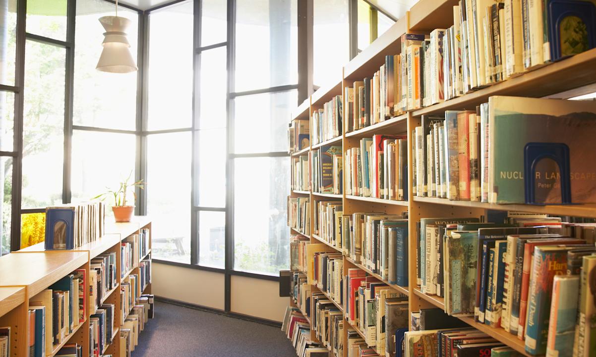 A photo of bookshelves in a library