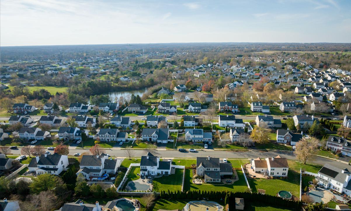 Drone shot of beautiful houses in Freehold, New Jersey, United States in summer