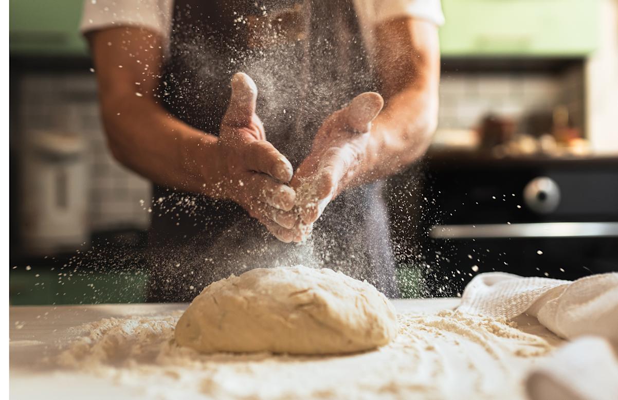 Chef working with fresh dough